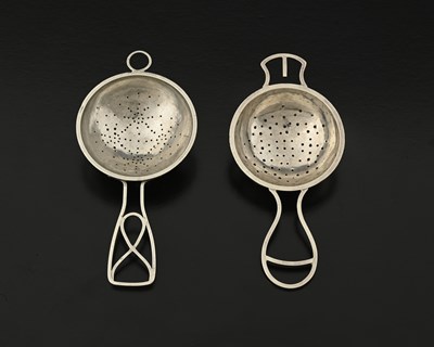 Lot 163 - A Modernist silver tea strainer, with a...