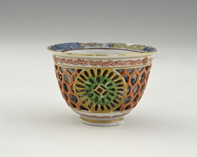 Lot 367 - A Chinese doucai reticulated cup, Chenghua...