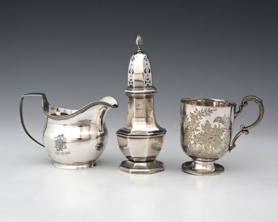 Lot 282 - A George III silver helmet-shaped milk jug,...