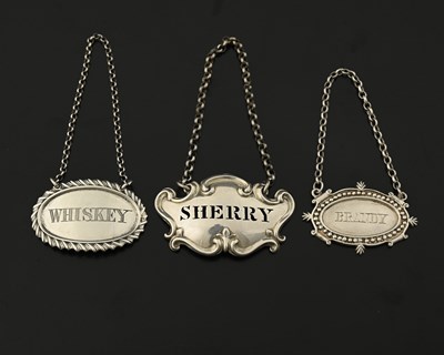 Lot 198 - A William IV silver wine label, pierced for...