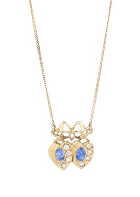 Lot 57 - An 18ct gold sapphire and diamond heart and bow necklace