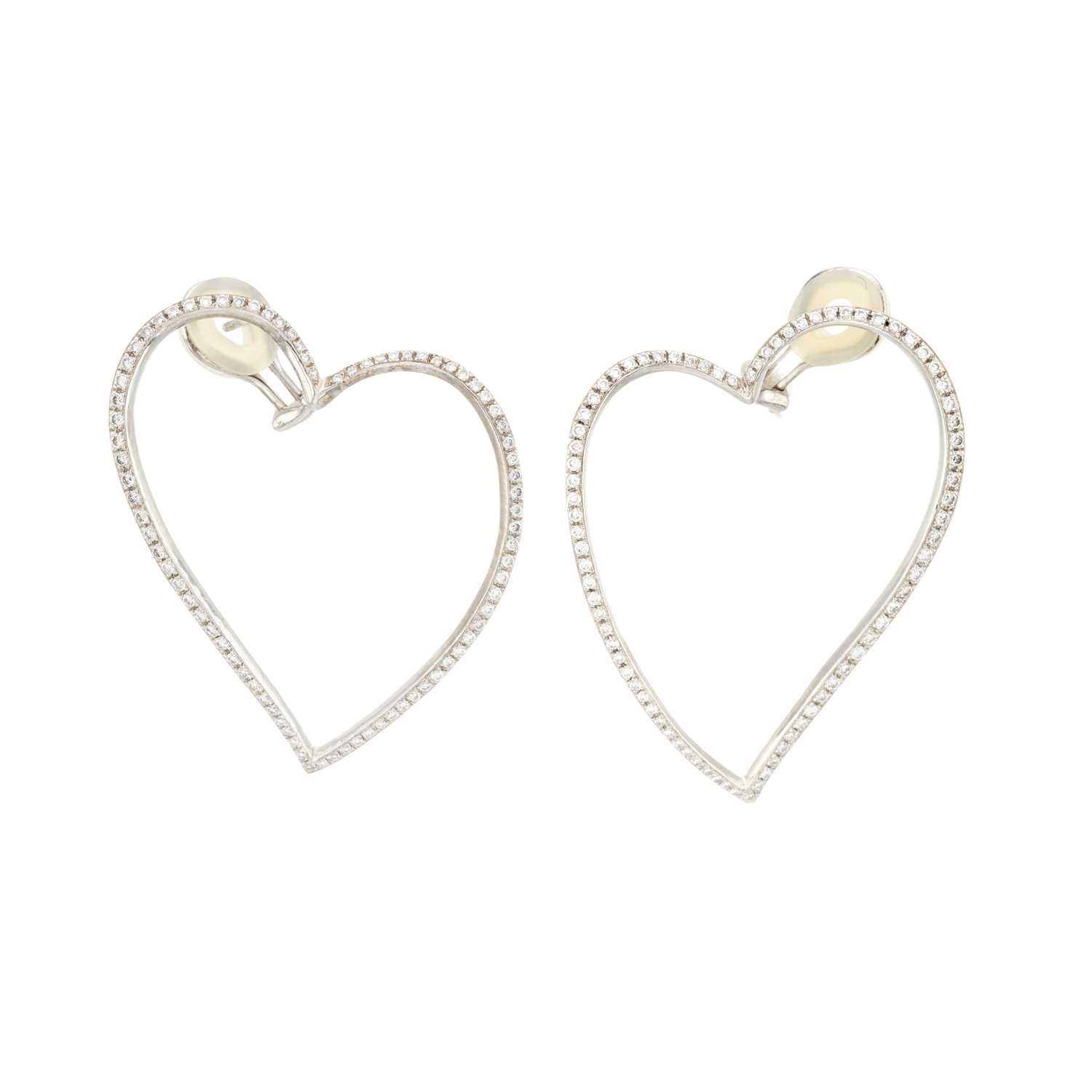 Lot 62 - A pair of 18ct gold diamond heart earrings