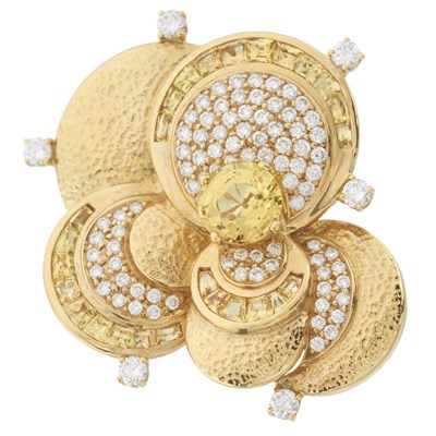 Lot 172 - An 18ct gold yellow sapphire and diamond cocktail dress ring