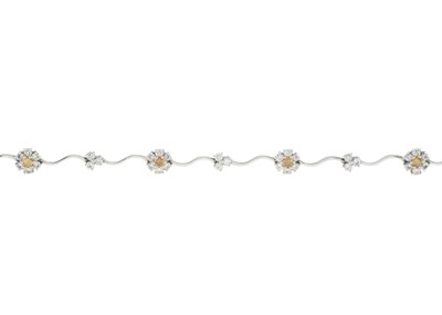 Lot 65 - An 18ct gold yellow diamond and diamond floral cluster bracelet