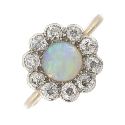 Lot 17 - An early 20th century 18ct gold opal and diamond cluster ring