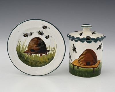 Lot 580 - Wemyss, a beehive painted honey pot and cover...