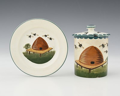 Lot 581 - Wemyss, a beehive painted honey pot and cover...