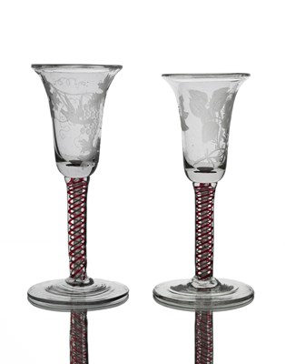 Lot 453 - A matched pair of Dutch engraved colour twist...