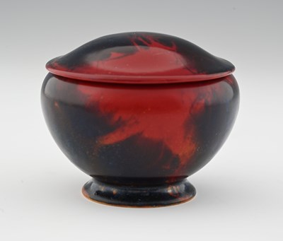 Lot 634 - A Doulton flambe jar and cover, shouldered...
