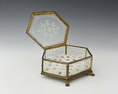 Lot 228 - A French gilt metal and enamelled glass jewel...