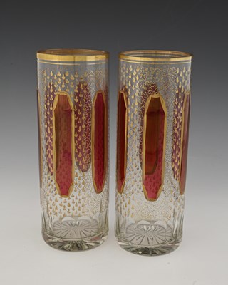 Lot 464 - A pair of Bohemian gilt and ruby washed glass...