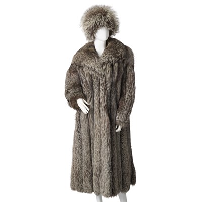 Lot 507 - A full-length silver fox fur coat and hat.