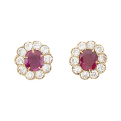 Lot 146 - A pair of high carat gold ruby and diamond cluster earrings