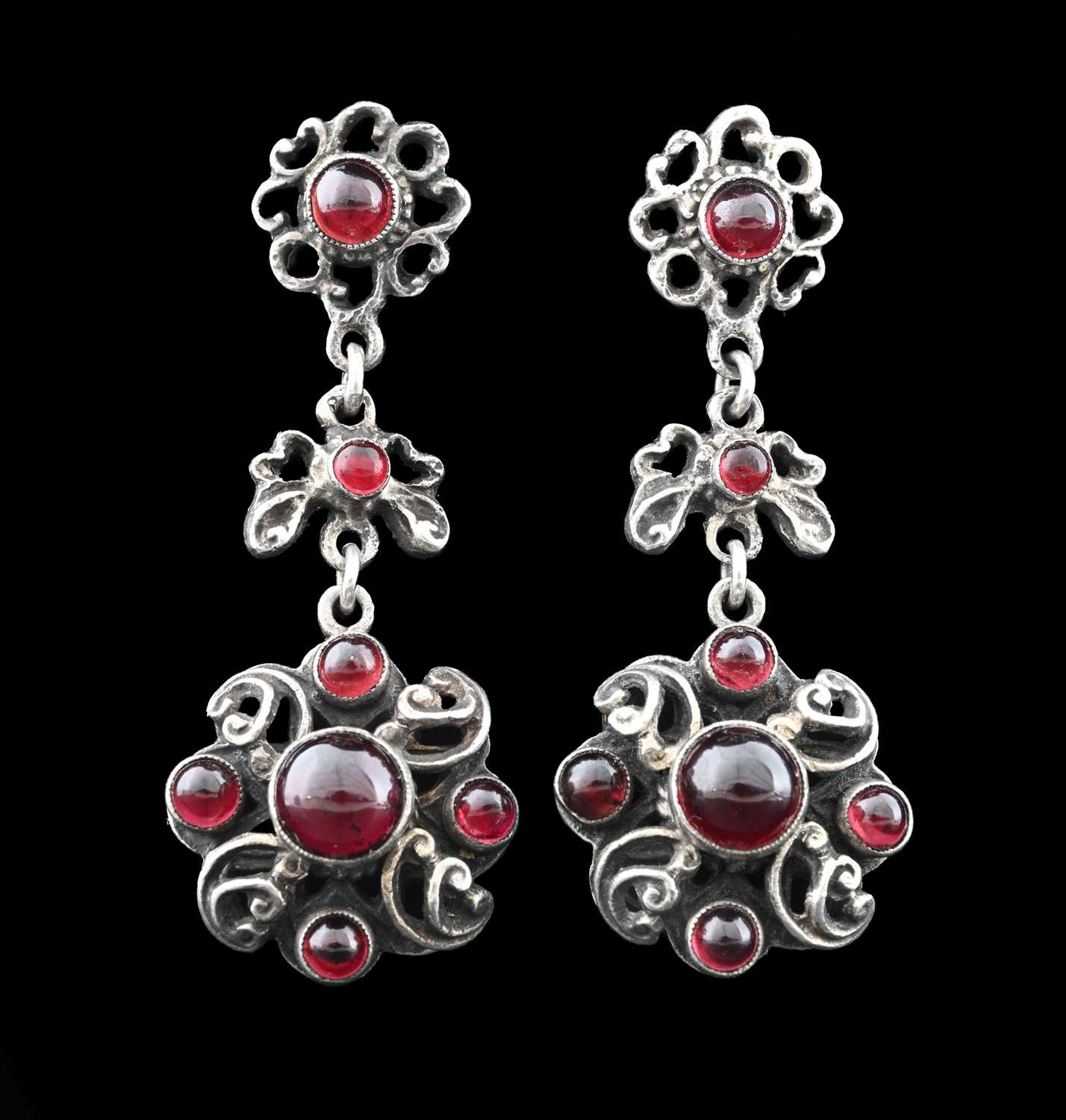 Lot 14 - A pair of early to mid 20th century silver garnet drop earrings