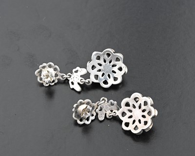 Lot 14 - A pair of early to mid 20th century silver garnet drop earrings