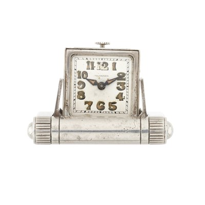 Lot 279 - Tavennes, a white metal travel clock