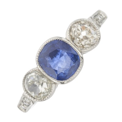 Lot 29 - An early 20th century 18ct gold and platinum sapphire and diamond three-stone ring