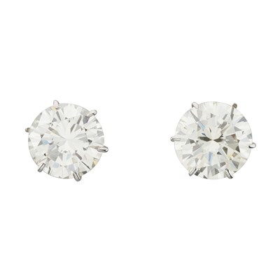 Lot 67 - An impressive pair of brilliant-cut diamond single-stone stud earrings