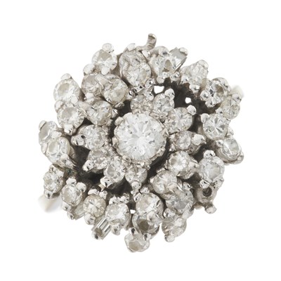 Lot 104 - A mid 20th century 18ct gold and platinum, vari-cut diamond swirl cluster ring