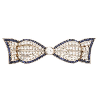 Lot 81 - A diamond and sapphire bow brooch