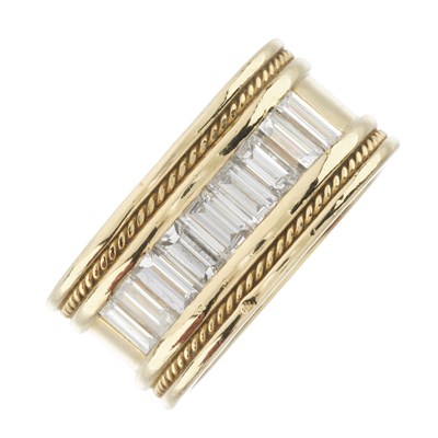Lot 51 - An 18ct gold diamond band ring