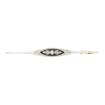 Lot 71 - An early to mid 20th century gold and platinum, diamond and onyx bar brooch