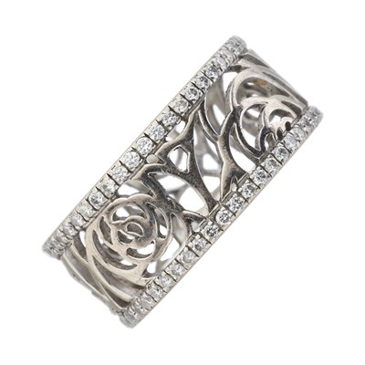 Lot 320 - Chanel, an 18ct gold diamond Camelia Ajoure full eternity ring.