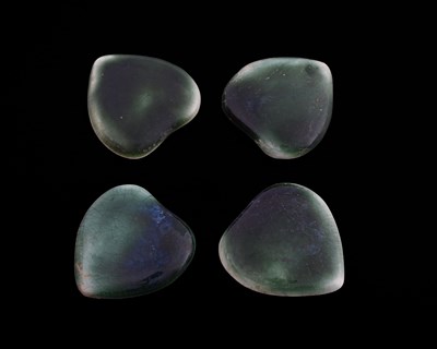 Lot 612 - Ruskin Pottery, a set of four Souffle glazed...