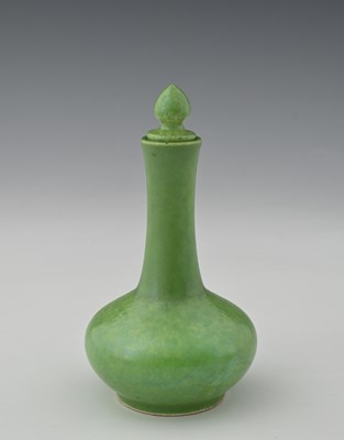 Lot 597 - Ruskin Pottery, a green lustre fruit skin...