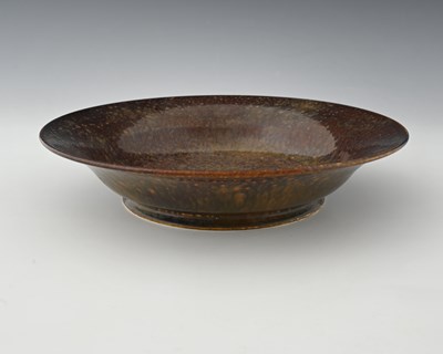 Lot 604 - Ruskin Pottery, a Souffle type fruit skin...