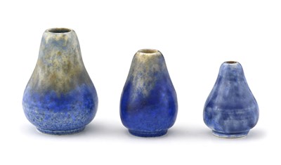 Lot 629 - Ruskin Pottery, a graduated set of three...