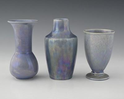 Lot 603 - Ruskin Pottery, three Lavender Lustre vases,...