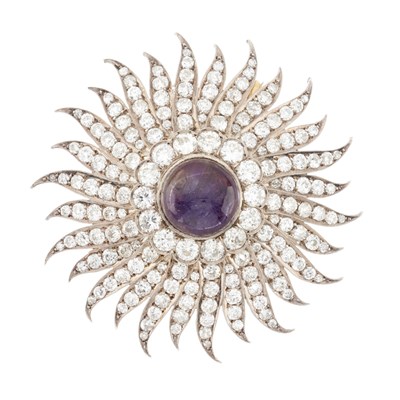 Lot 33 - A late Victorian silver and gold, amethyst and diamond sunburst brooch, circa 1885