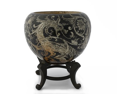 Lot 588 - Martin Brothers, a stoneware Dragon jardiniere,...