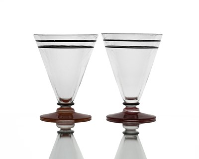 Lot 525 - Stuart and Sons, a pair of Art Deco enamelled...