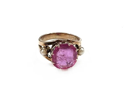 Lot 1 - A gold pink sapphire and pearl dress ring
