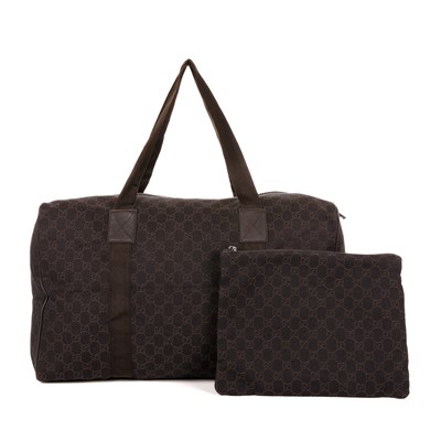 Lot 250 - Gucci, a GG duffle bag and matching pouch.