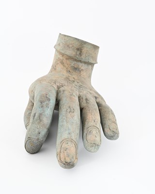 Lot 399 - A large green patinated bronze hand sculpture,...