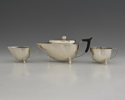 Lot 394 - An Edwardian silver three piece tea set, of...
