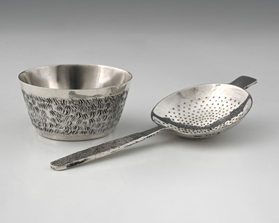 Lot 164 - An Elizabeth II silver tea strainer on stand,...
