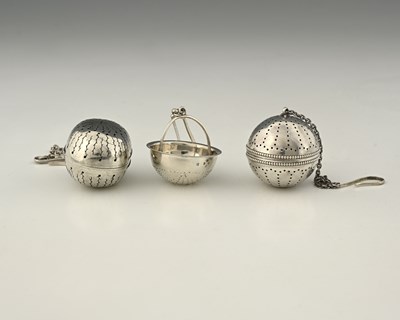 Lot 148 - A Victorian silver tea infuser, the pierced...