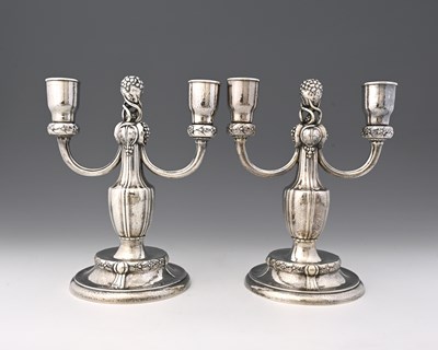 Lot 136 - Georg Jensen, a pair of Danish silver...