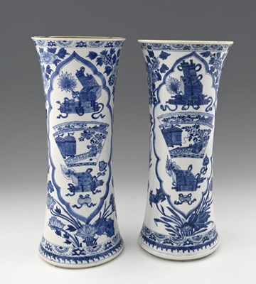 Lot 383 - A pair of Chinese blue and white vases, leaf...