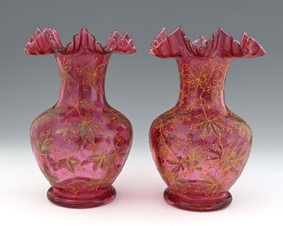 Lot 474 - A pair of Bohemian enamelled ruby glass vases,...