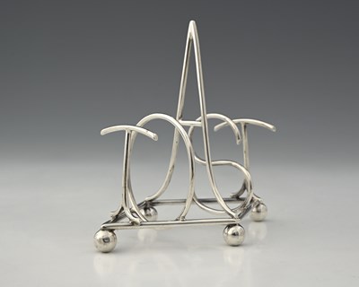 Lot 639 - Hukin and Heath, a novelty silver toast rack,...