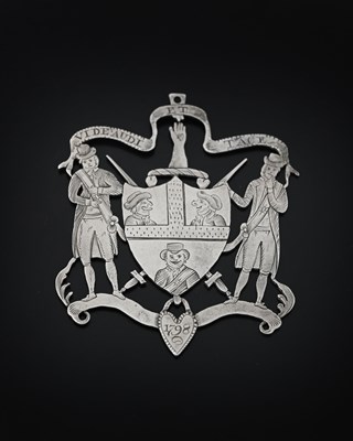 Lot 716 - A George III silver pierced badge with the...