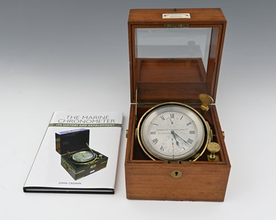 Lot 450 - A Dobbie McInnes Marine Chronometer and a copy of 'The Marine Chronometer'