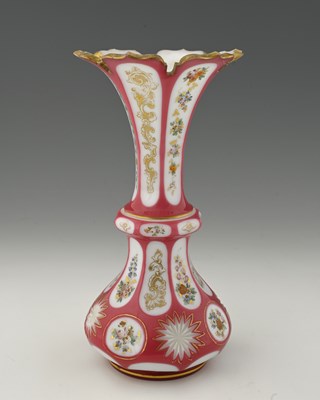 Lot 494 - A Bohemian enamelled and gilt pink and opaque...