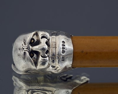 Lot 322 - A Victorian novelty silver-mounted walking...