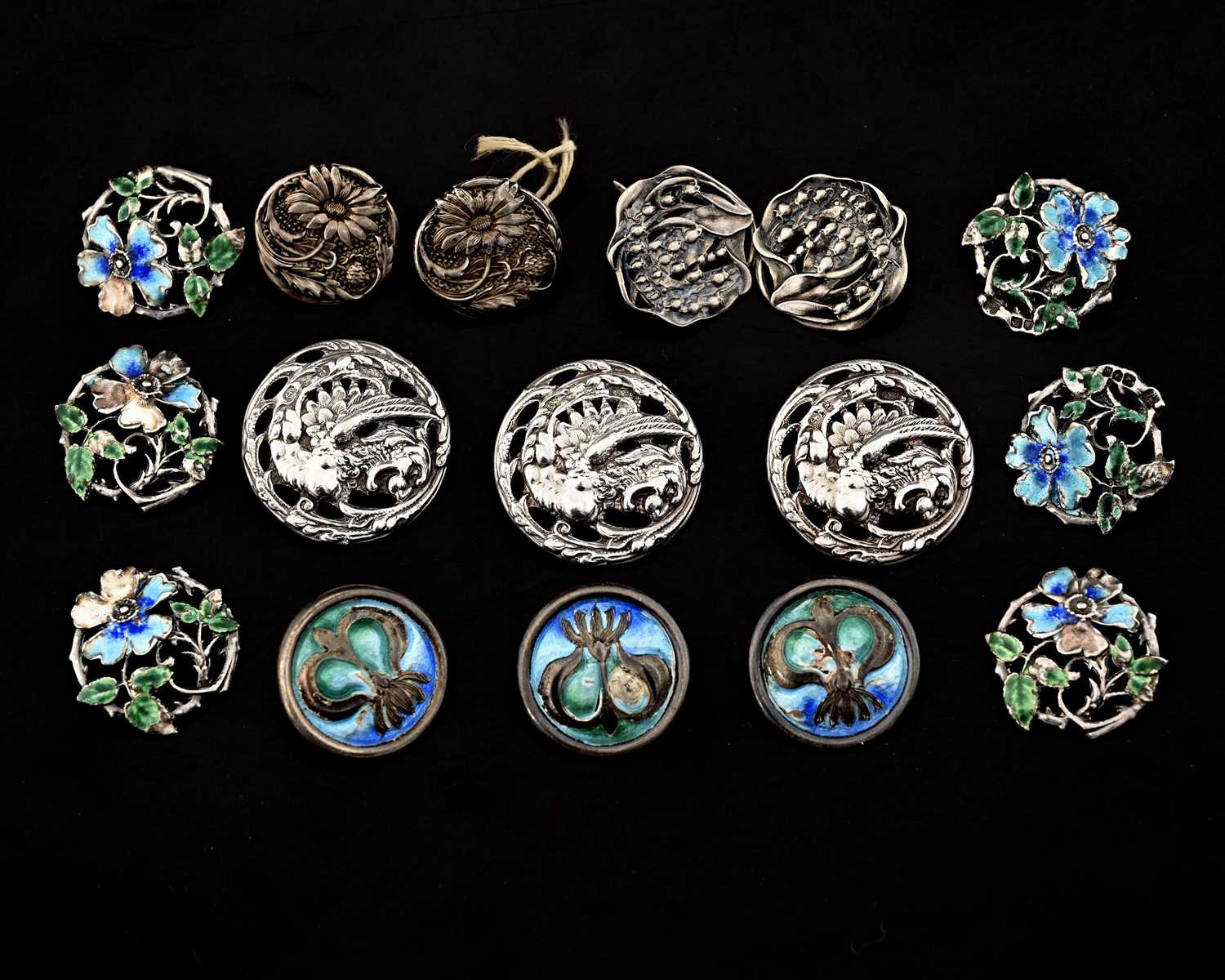 Lot 26 - A collection of Arts and Crafts silver and...